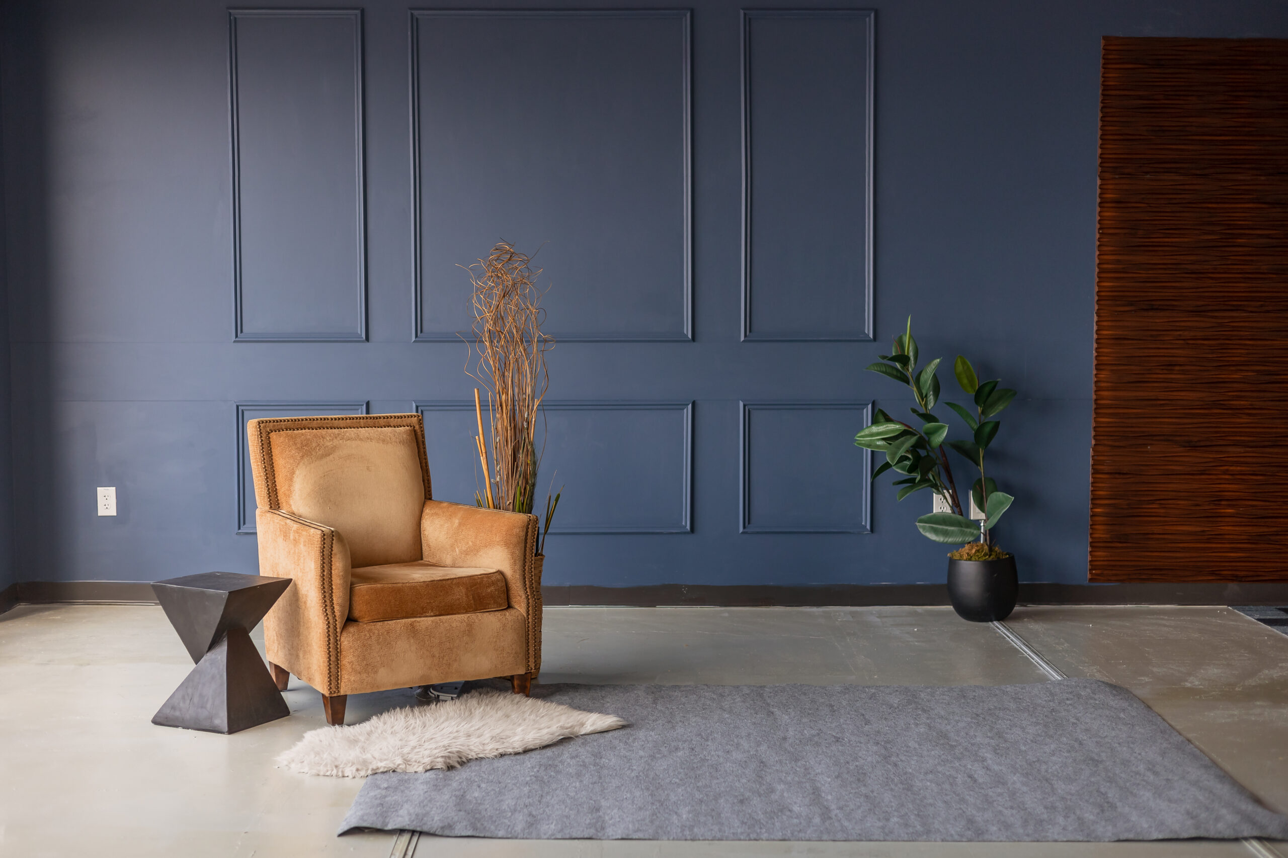 Natural light downtown Photography studio rental space in Phoenix with navy background.