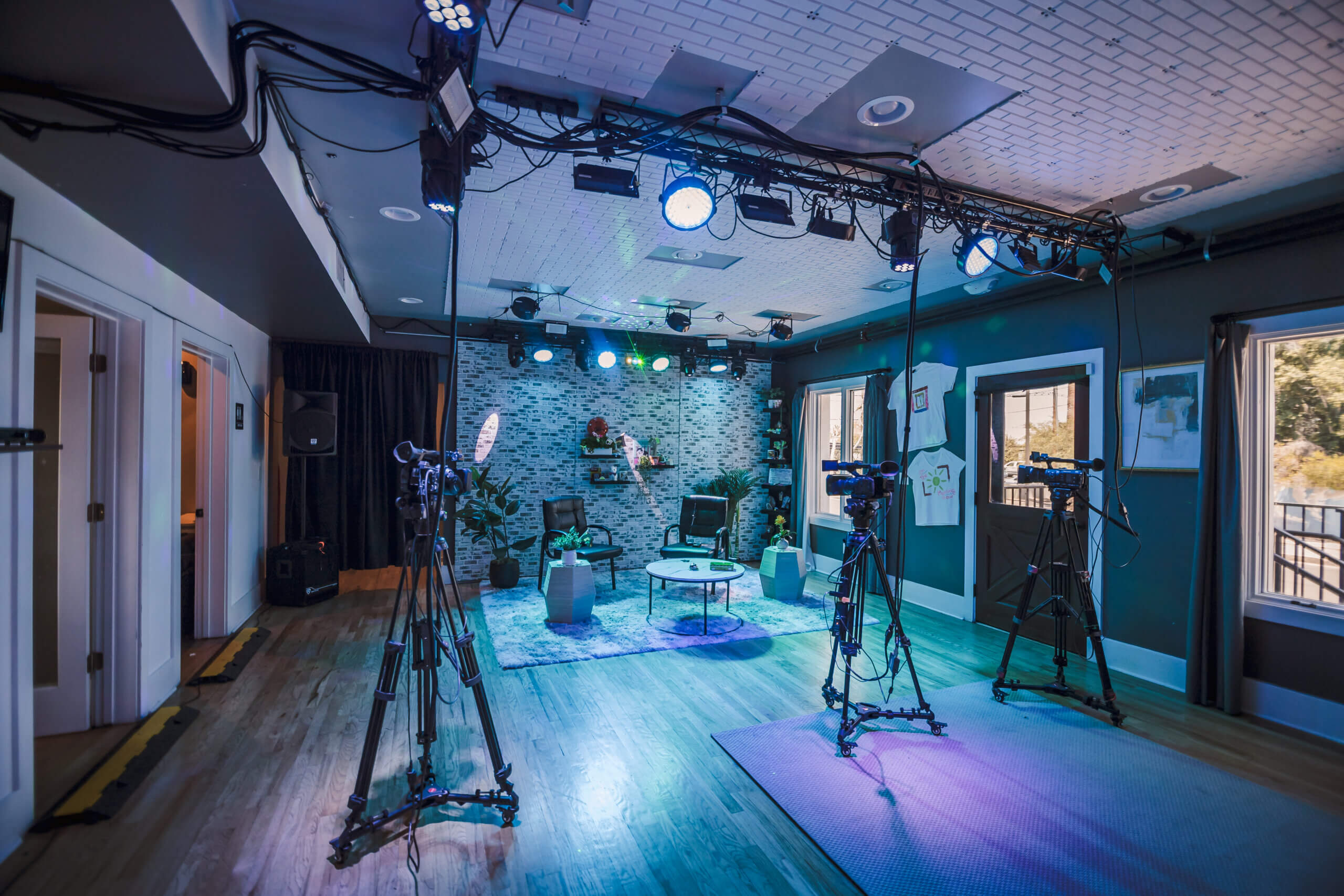 Downtown Phoenix creative event rental space, showing Studio A equipped with cameras, lighting, audio, and backdrop perfect for entertainment and filming.